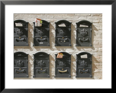 Mailboxes Lined On A Stone Wall, Ravenna, Italy by Gina Martin Pricing Limited Edition Print image