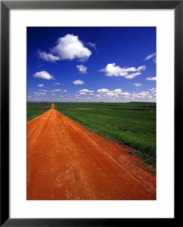 Red Road Of Scoria Near Fryburg, North Dakota, Usa by Chuck Haney Pricing Limited Edition Print image