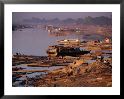 Floating Logs And Bamboo By Riverside, Sagaing, Myanmar (Burma) by Anders Blomqvist Pricing Limited Edition Print image