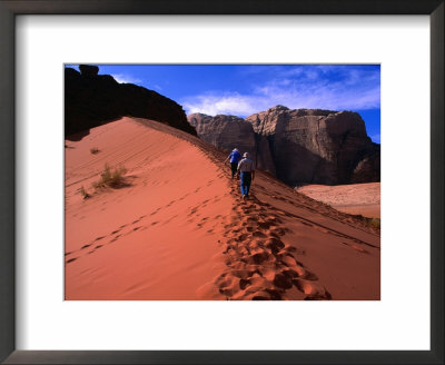 Tourists Trudging Up Sand Dune Cascading From North Face Of Jebel Umm Ulaydiyya, Aqaba, Jordan by Mark Daffey Pricing Limited Edition Print image