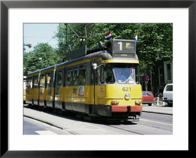 Trams Take Precedence Over All Traffic Except Cycles, Amsterdam, Holland by Michael Short Pricing Limited Edition Print image