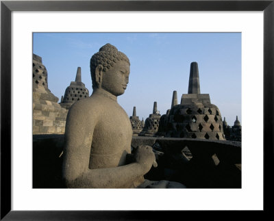 Buddha Image Sitting In Open Chamber With Stupas In Background, Borobudur Temple, Indonesia by Jane Sweeney Pricing Limited Edition Print image