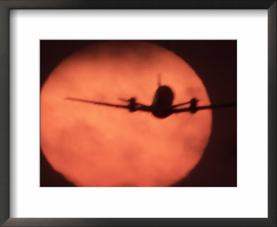 Jetliner Takeoff Framed By Sunset by Doug Mazell Pricing Limited Edition Print image