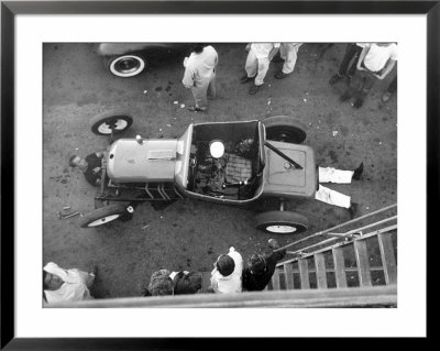 Hot Rodder Tuning Up His Car Before A Race by Ralph Crane Pricing Limited Edition Print image