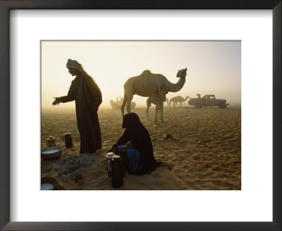 Bedouins Cooking On The Sand At Their Camp At Sahamah, Oman by James L. Stanfield Pricing Limited Edition Print image