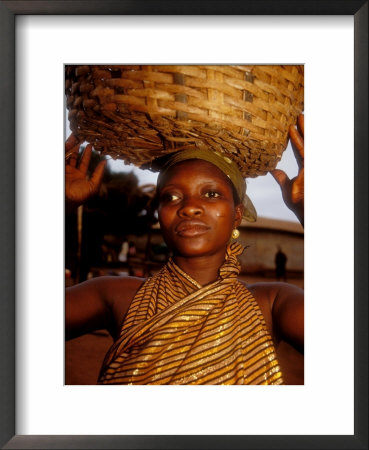 Woman Wearing Gold Fabric Dress And Carrying Basket, Kabile, Brong-Ahafo Region, Ghana by Alison Jones Pricing Limited Edition Print image
