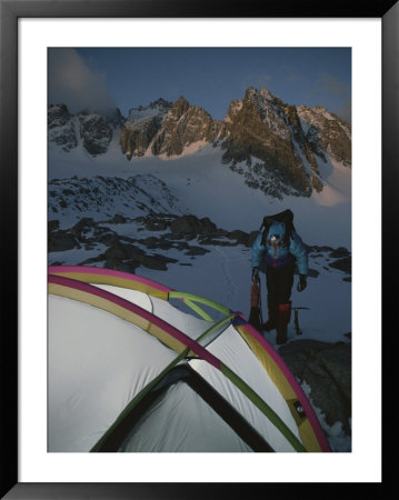 A Mountain Climber Prepares For A Dawn Start For His Ascent by Gordon Wiltsie Pricing Limited Edition Print image