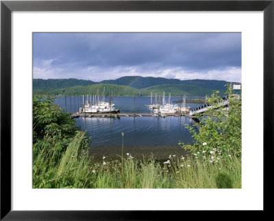 Rainbow Arcs Above Sailboats Moored In Thorne Bay, Alaska by Rich Reid Pricing Limited Edition Print image