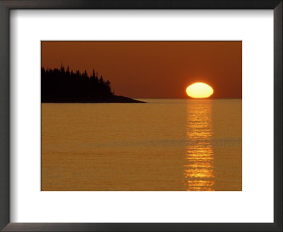 Spring Sunrise Silhouettes Edwards Island And Reflects Light On Lake Superior by Mark Carlson Pricing Limited Edition Print image