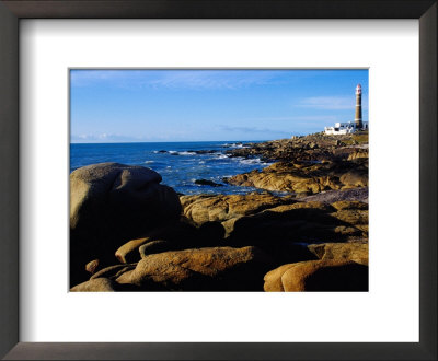 Rocky Coastline And Lighthouse, Cabo Polonio Forest Park, Rocha, Uruguay by Krzysztof Dydynski Pricing Limited Edition Print image