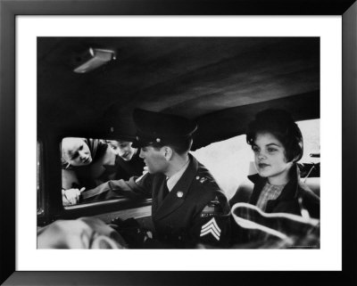 Elvis Presley In Uniform, In Backseat Of Car With Girlfriend, On His Way To Airport by James Whitmore Pricing Limited Edition Print image