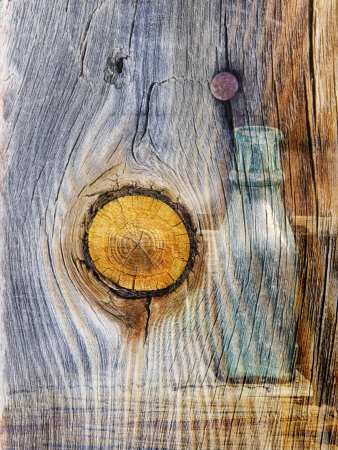 Double Exposure Of A Wood Surface And Bottle by Images Monsoon Pricing Limited Edition Print image