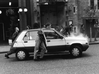 Pushing A Broken-Down Renault 5 Car by Shirley Baker Pricing Limited Edition Print image