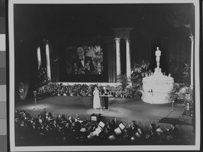 Producer Cecil B. Demille Accepting Oscar From Mary Pickford At The First Televised Academy Awards by J. R. Eyerman Pricing Limited Edition Print image