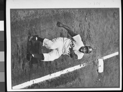 Brooklyn Dodger Jackie Robinson After Rounding 3Rd Base During The World Series At Yankee Stadium by Ralph Morse Pricing Limited Edition Print image