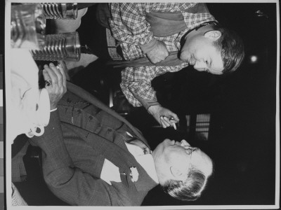 Writer Damon Runyon Talking With Actor Jack Oakie by Gjon Mili Pricing Limited Edition Print image