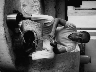 Dancer Jose Limon In Kitchen Of His Home by Gjon Mili Pricing Limited Edition Print image