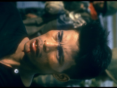 A Captured Vietcong Suspect During Vietnam War by Larry Burrows Pricing Limited Edition Print image