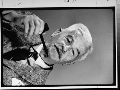Author William Faulkner Pensively Holding His Pipe by Carl Mydans Pricing Limited Edition Print image