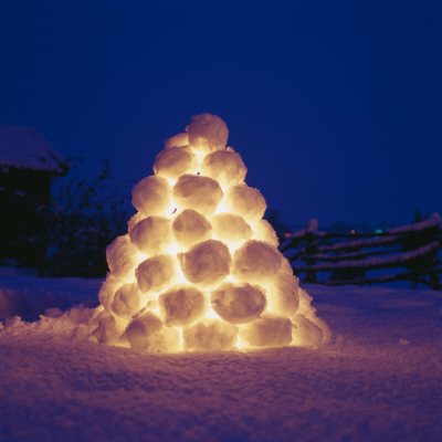 A Light Inside Of A Pyramid Made Out Of Snowballs by Ove Eriksson Pricing Limited Edition Print image