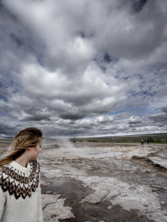 A Woman Standing By Geyser, Iceland by Atli Mar Pricing Limited Edition Print image