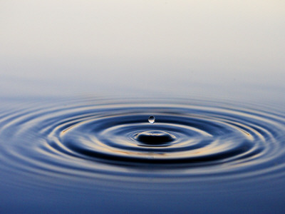 Ripples In Water From Droplet Breaking The Surface by Anders Ekholm Pricing Limited Edition Print image