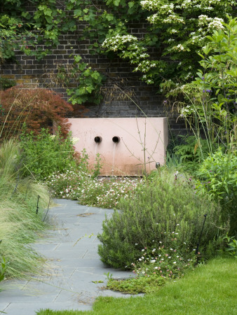 Grey Slate Path Leads To Pink Rendered Cement Water Feature, Designer: Charlotte Sanderson by Clive Nichols Pricing Limited Edition Print image