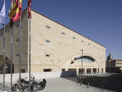 Palacio De Congresos Y Exposiciones With Motorcycles And Flags Seen From Plaza De San Bartholome by David Borland Pricing Limited Edition Print image