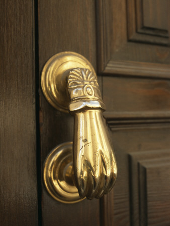 Cordoba, Andalucia, Spain, - Detail Of A Brass Door Knocker In The Form Of A Hand by Colin Dixon Pricing Limited Edition Print image