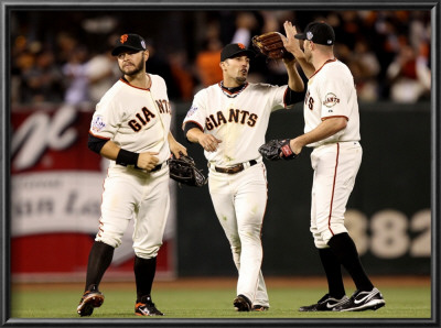 Texas Rangers V San Francisco Giants, Game 1: Cody Ross, Andres Torres, Nate Schierholtz by Jed Jacobsohn Pricing Limited Edition Print image