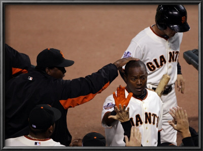 Texas Rangers V San Francisco Giants, Game 2: Edgar Renteria by Ezra Shaw Pricing Limited Edition Print image
