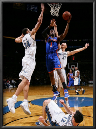 New York Knicks V Washington Wizards: Amar'e Stoudemire, Javale Mcgee, Kirk Hinrich And Yi Jianlian by Ned Dishman Pricing Limited Edition Print image