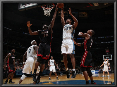 Miami Heat V Washington Wizards: Hilton Armstrong And Joel Anthony by Ned Dishman Pricing Limited Edition Print image