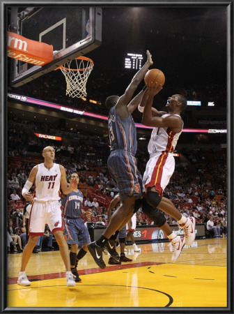 Charlotte Bobcats V Miami Heat: Chris Bosh And Nazr Mohammed by Mike Ehrmann Pricing Limited Edition Print image