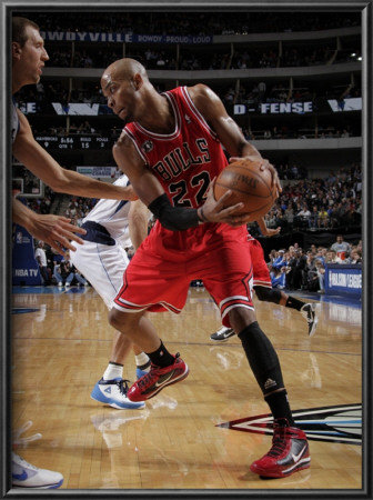 Chicago Bulls V Dallas Mavericks: Taj Gibson And Dirk Nowitzki by Glenn James Pricing Limited Edition Print image