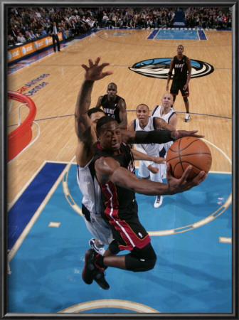 Miami Heat V Dallas Mavericks: Dwyane Wade And Tyson Chandler by Glenn James Pricing Limited Edition Print image
