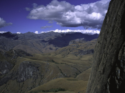Rock Face Overlooking Mountains, Madagascar by Michael Brown Pricing Limited Edition Print image
