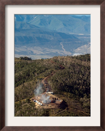 Smoke Rises From A Drilling Rig On The Roan Plateau by Peter M. Fredin Pricing Limited Edition Print image