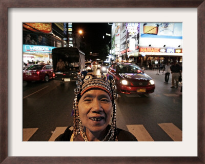 An Aka Hill Tribe Woman Smiles As She Waits To Sell Souvenirs by David Longstreath Pricing Limited Edition Print image