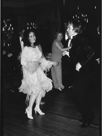 Liz Taylor And Rudolf Noureïev Dancing Together, March 24, 1968 by Benno Graziani Pricing Limited Edition Print image