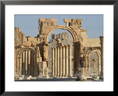 Qala'at Ibn Maan Castle Seen Through Monumental Arch, Archaelogical Ruins, Palmyra, Syria by Christian Kober Pricing Limited Edition Print image
