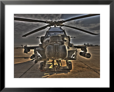 Seven Exposure Hdr Image Of An Ah-64D Apache Helicopter As It Sits On Its Pad by Stocktrek Images Pricing Limited Edition Print image