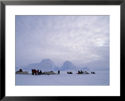 An Inuit-Led Expedition Parks Beside Icebergs Frozen Into Baffin Bay by Gordon Wiltsie Pricing Limited Edition Print image