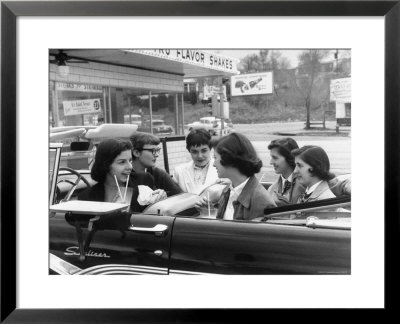 Teenage Girls Enjoying Milkshakes At Drive In Restaurant by Nina Leen Pricing Limited Edition Print image