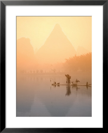 Fisherman On Bamboo Raft In Early Morning Mist, Li River, China by Keren Su Pricing Limited Edition Print image