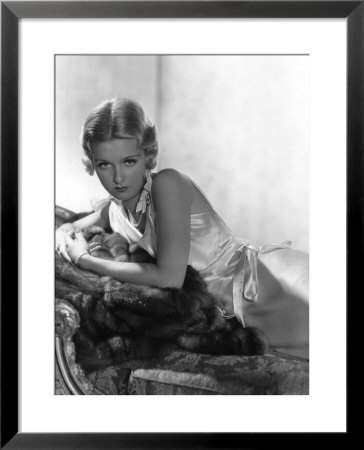 Joan Bennett Reclining, 1933 by George Hurrell Pricing Limited Edition Print image