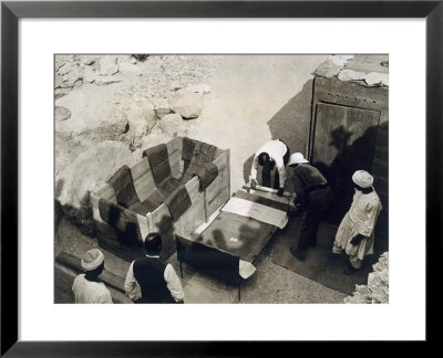 Moving The Centre Portion Of One Of The Beds, Tomb Of Tutankhamun, Valley Of The Kings, 1922 by Harry Burton Pricing Limited Edition Print image