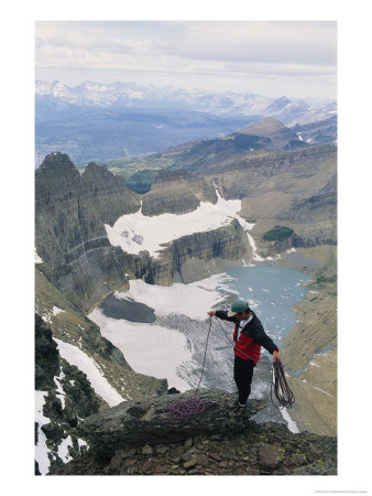 A Mountaineer Coils His Rope On Mt. Gould In Glacier National Park by Gordon Wiltsie Pricing Limited Edition Print image