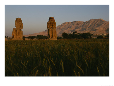 The Colossi Of Memnon, Statues In The Image Of Pharaoh Amenophis Iii by Kenneth Garrett Pricing Limited Edition Print image