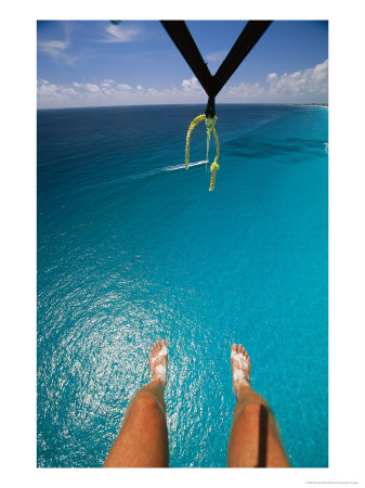 A Tourist Goes Parasailing In Cancun by Michael Melford Pricing Limited Edition Print image